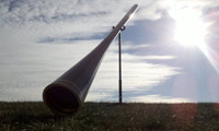 wooden didgeridoo outside